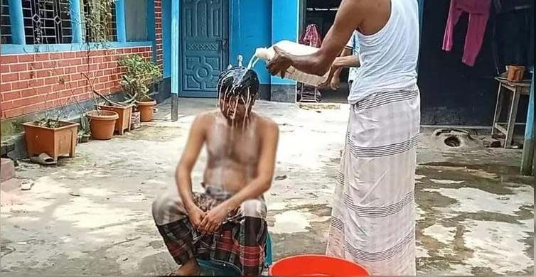 দুধ দিয়ে গোসল করে আনুষ্ঠানিক বিদায় নিলেন বিএনপি কর্মী - Surma Times | Sylhet News
